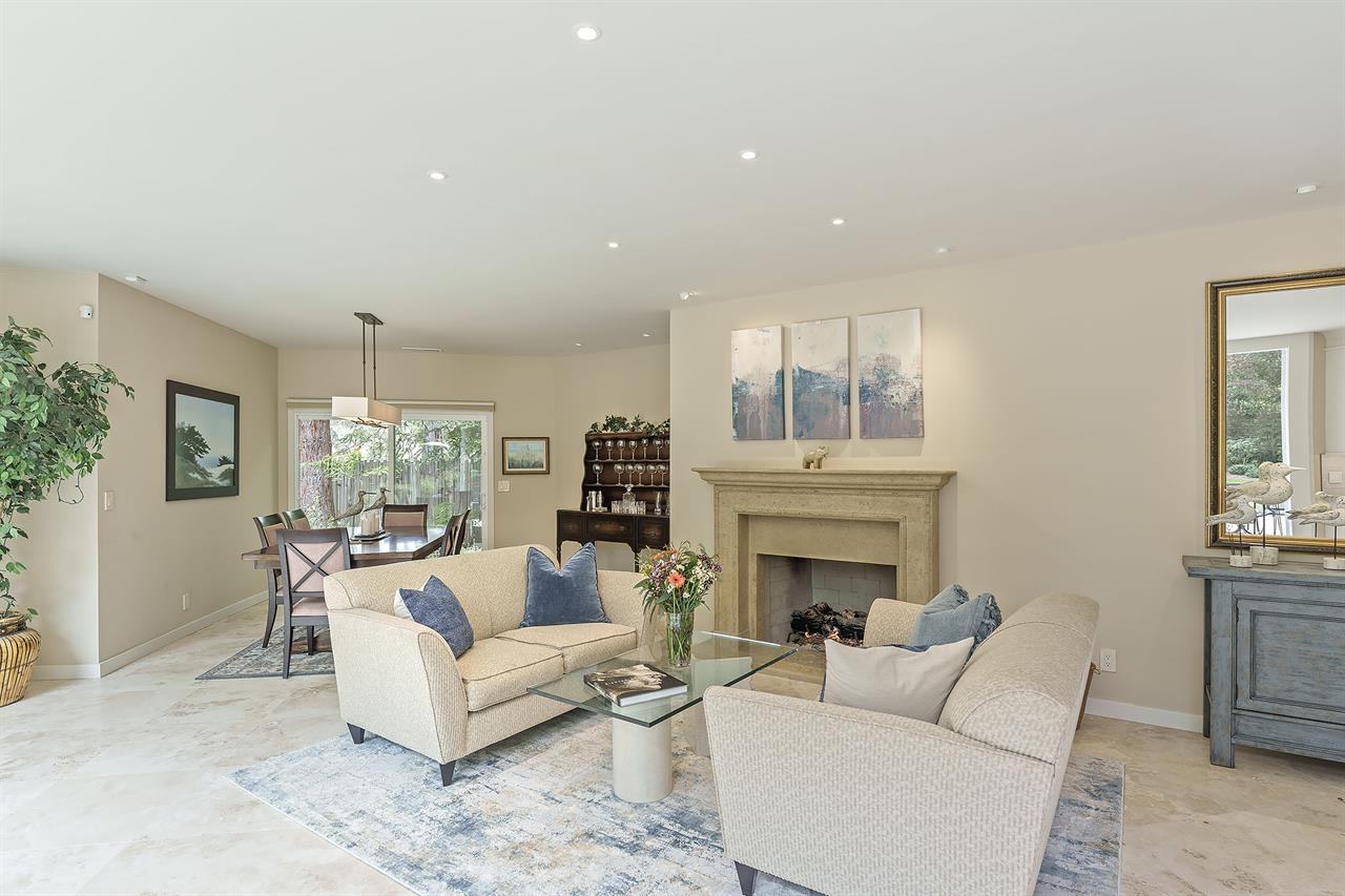 Living Room with Gas Fireplace and Dining Table