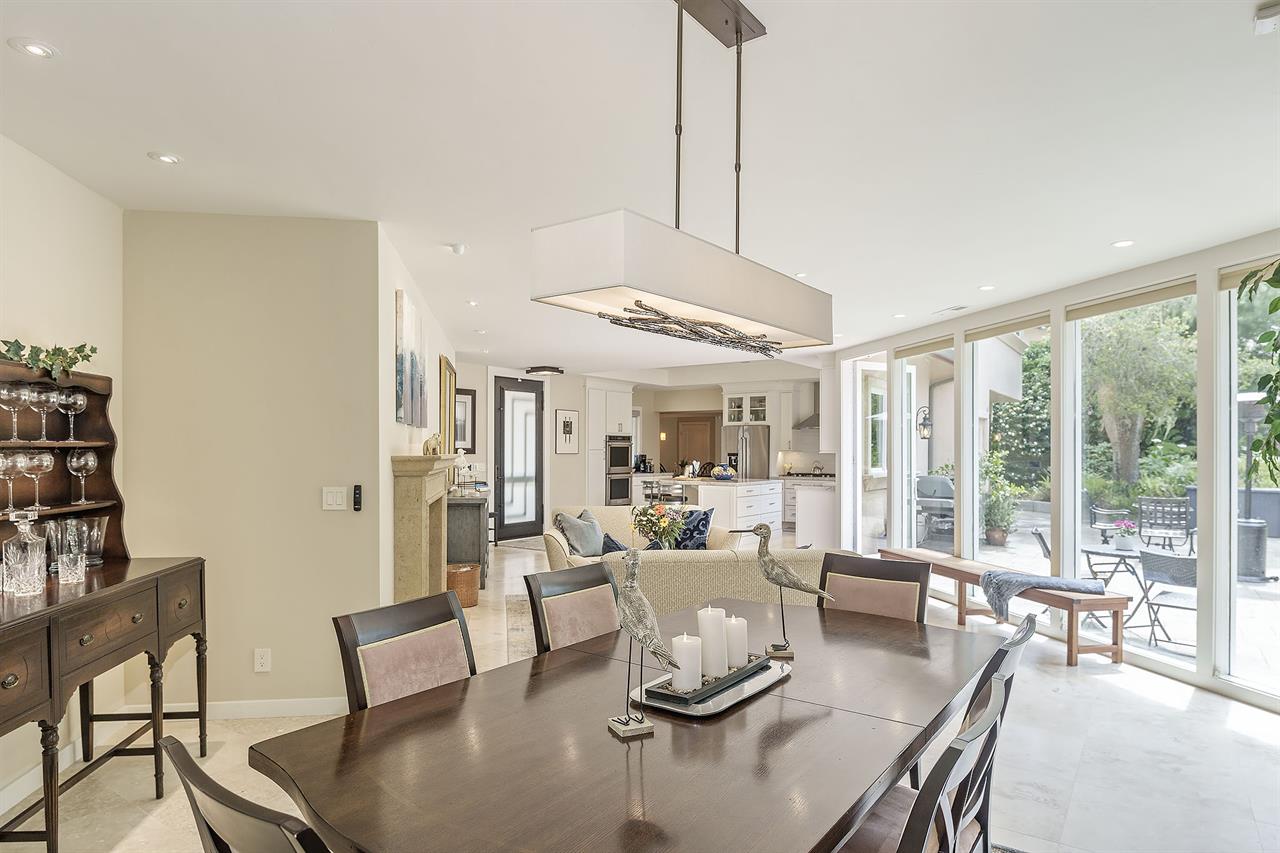 Living Room with Gas Fireplace and Dining Table