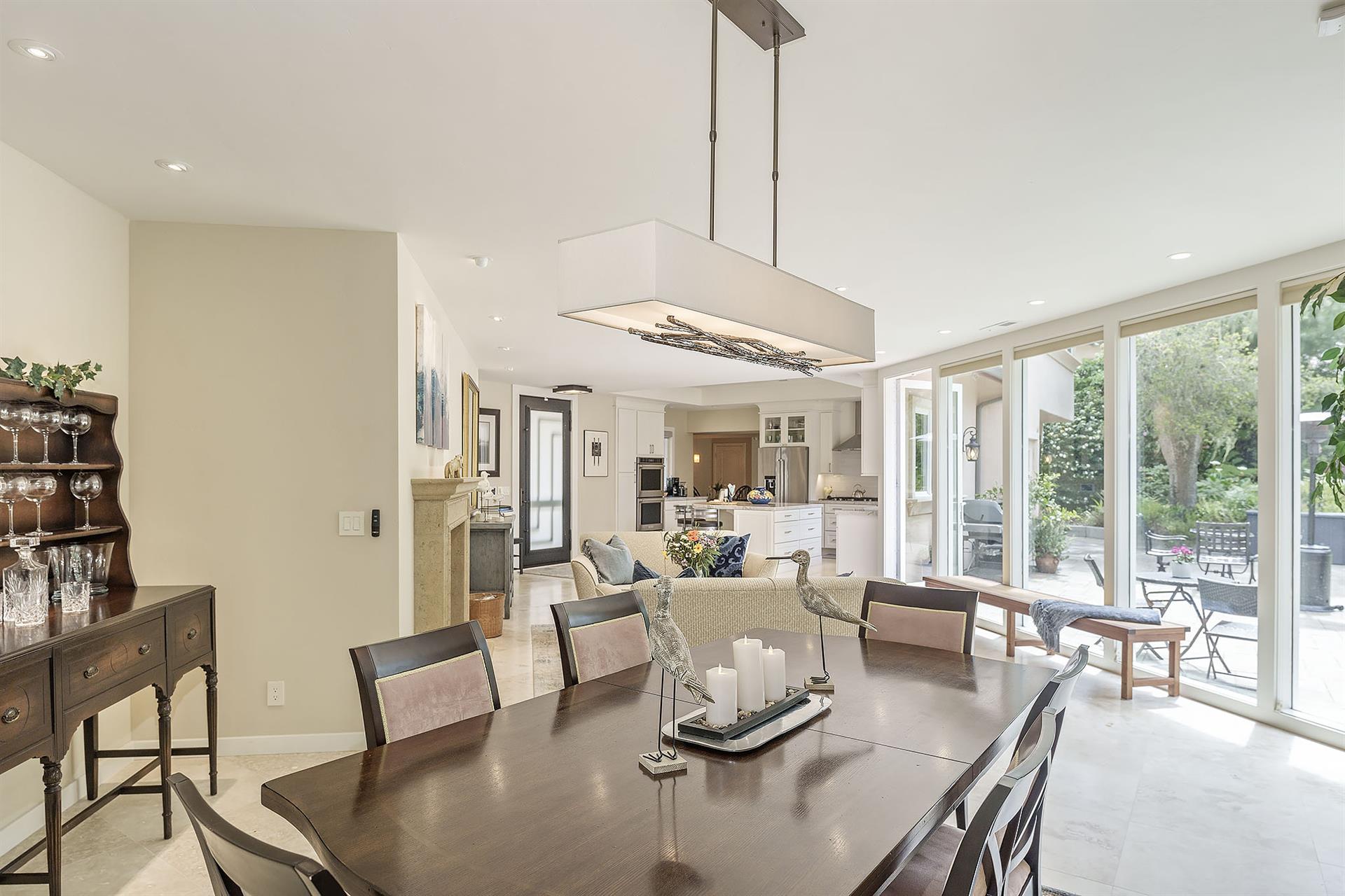 Living Room with Gas Fireplace and Dining Table