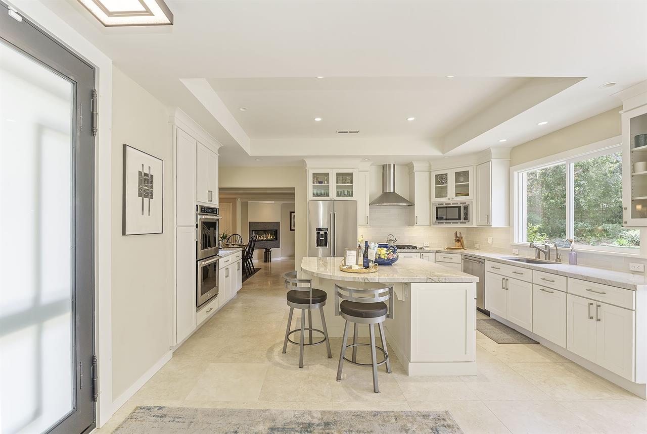 Fully Equipped Chefs Kitchen with Counter Seating at Island