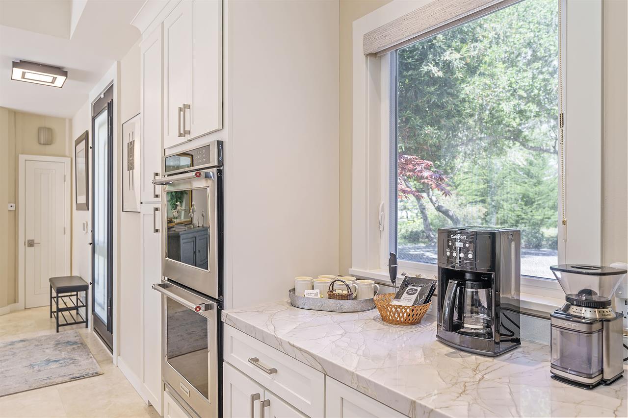 Fully Equipped Chefs Kitchen with Stainless Steel Appliances