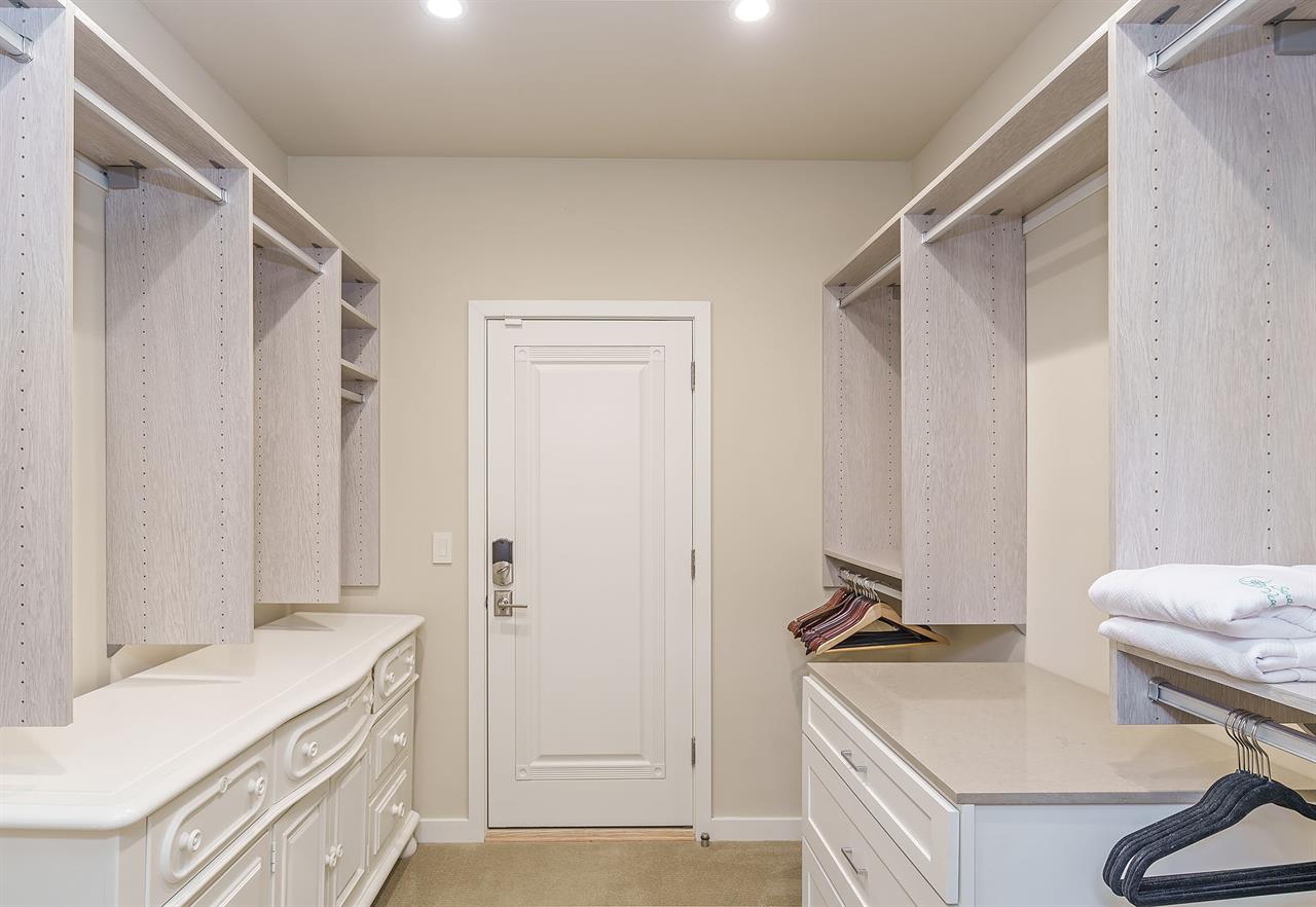 Downstairs Bedroom 1  WalkIn Closet with Washer and Dryer