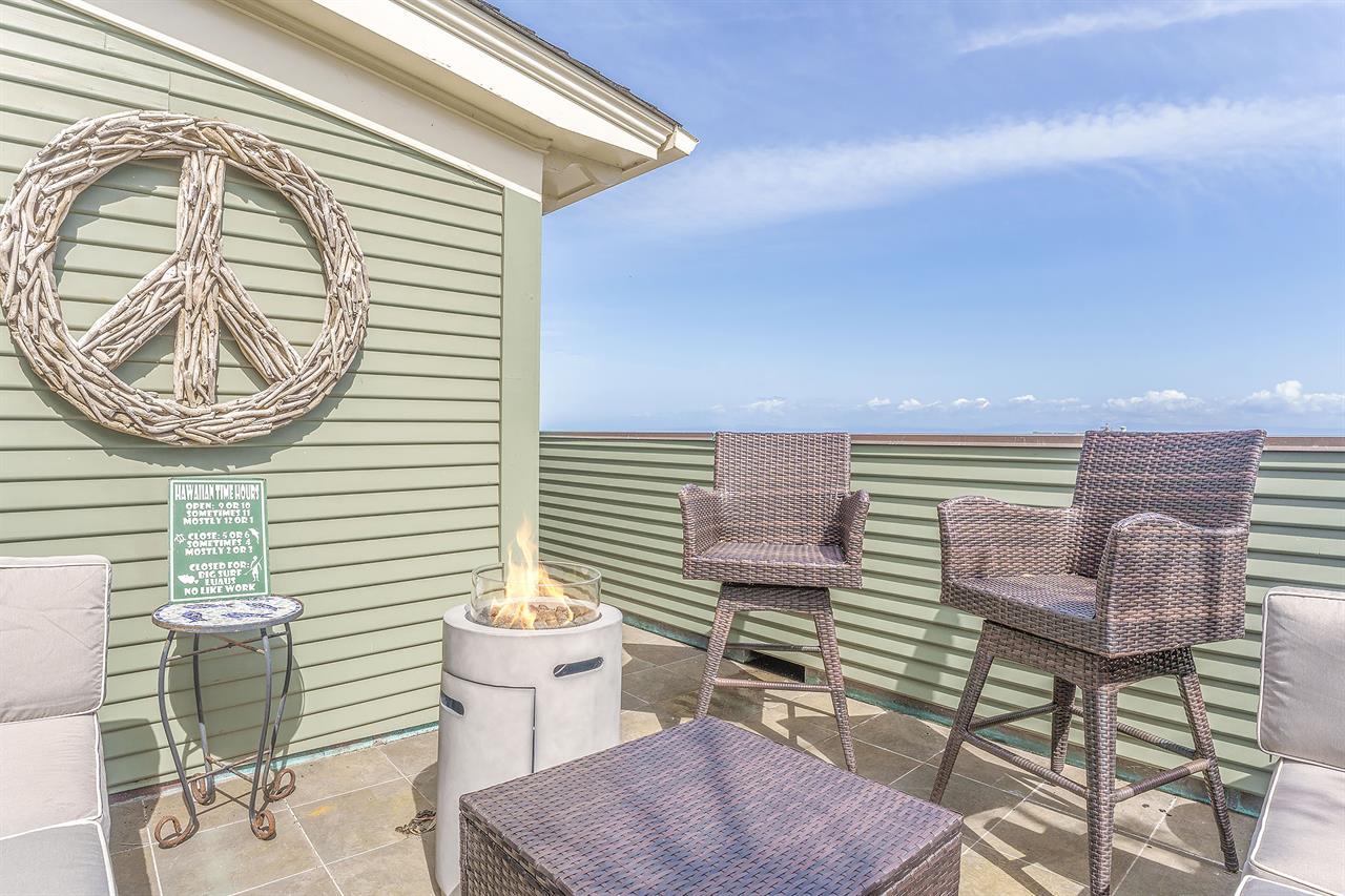 Upper Level Balcony has a Fire Pit