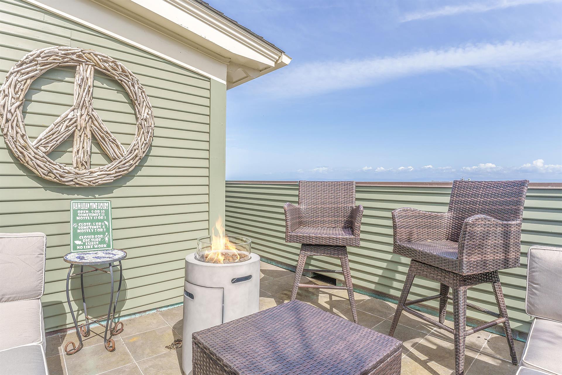 Upper Level Balcony has a Fire Pit