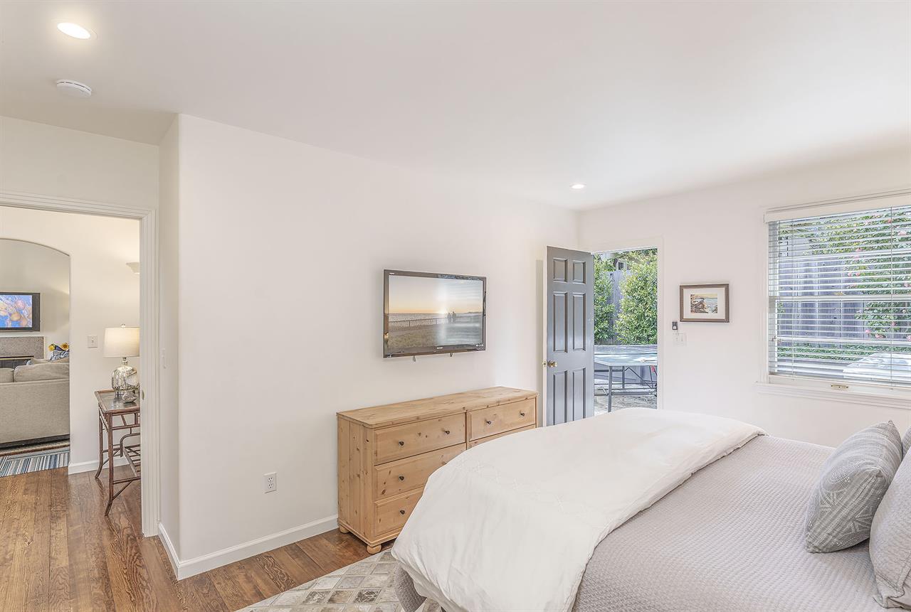 Bedroom 2. King Bed, TV, Patio Access