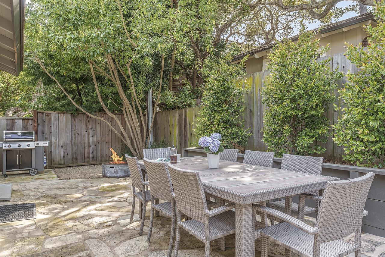 Backyard has a Fire Pit, Gas BBQ and Dining for 8