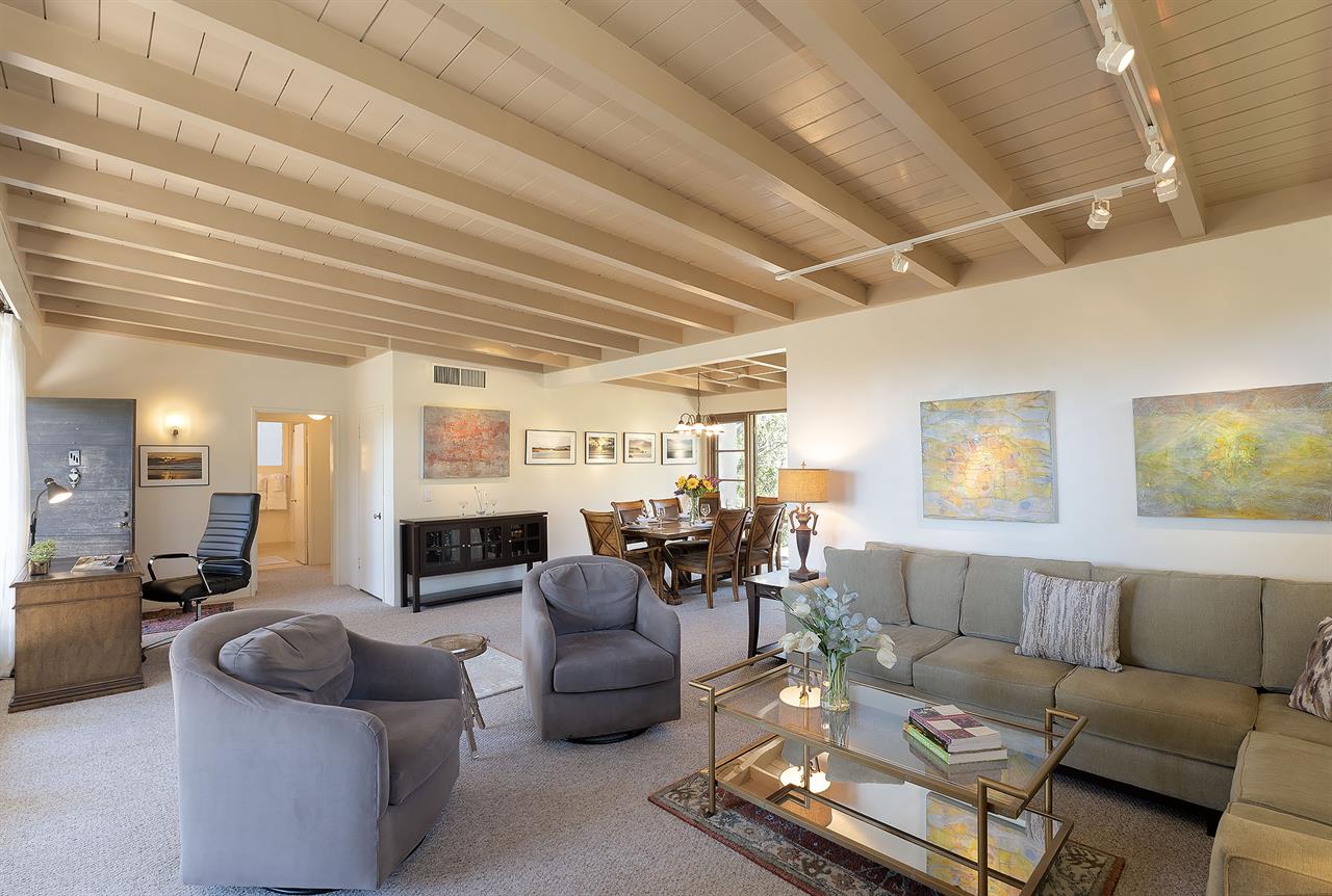 Living Room with CandleLit  Fireplace and HDTV