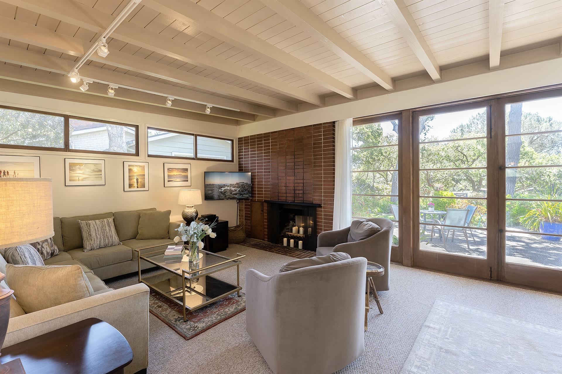Living Room with CandleLit  Fireplace and HDTV