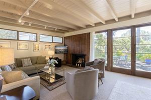 Living Room with CandleLit  Fireplace and HDTV