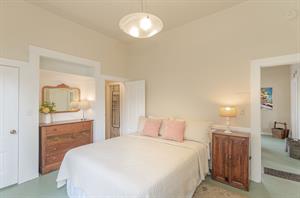 Bedroom 1  Queen Bed, En Suite Powder Room