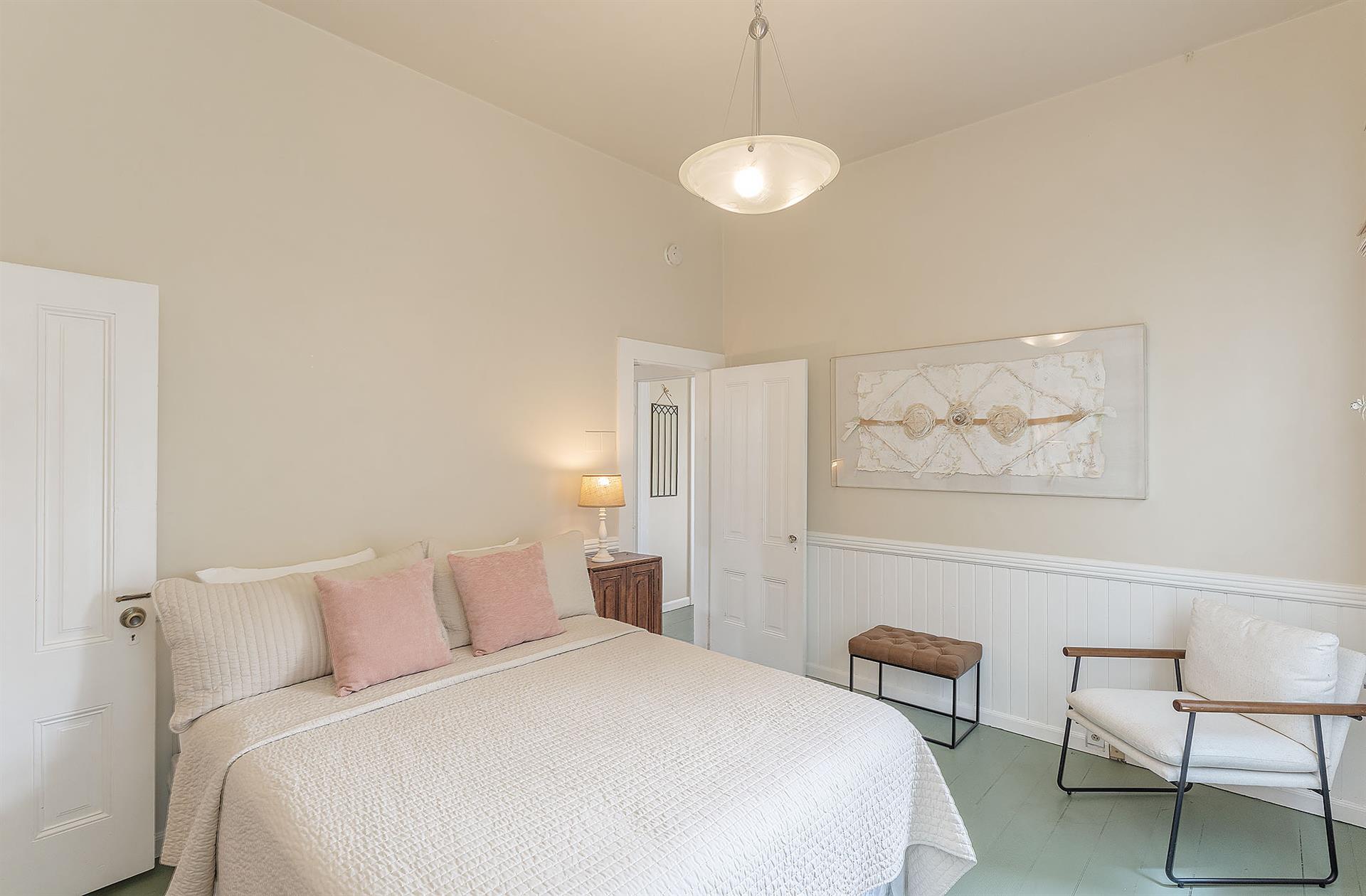 Bedroom 1  Queen Bed, En Suite Powder Room