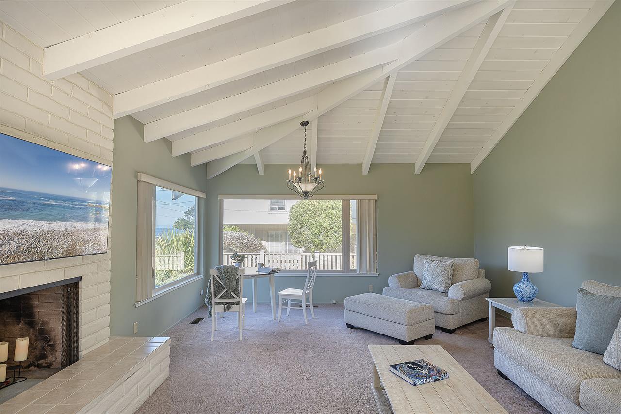 Living Room with CandleLit Fireplace and HDTV
