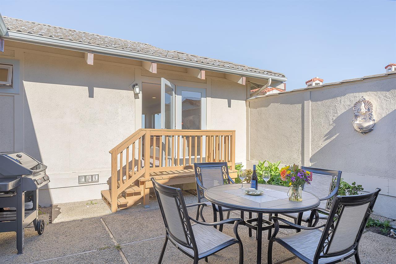 Private Enclosed Patio with a Gas Grill