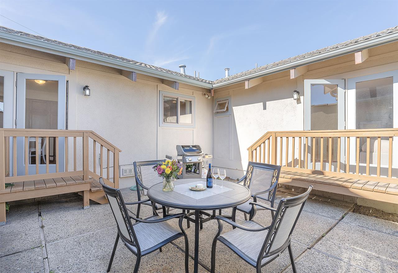 Private Enclosed Patio with a Gas Grill
