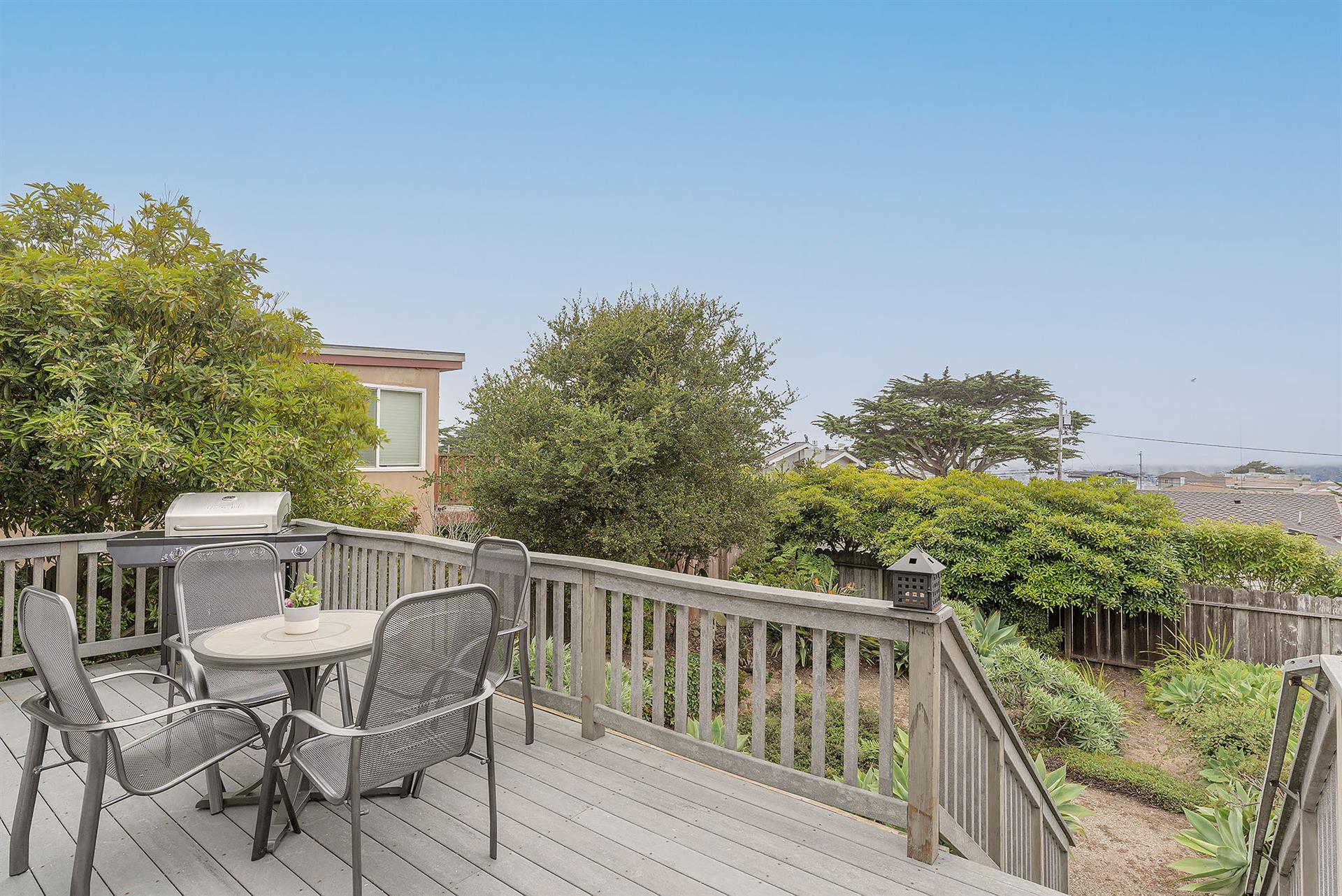 Back Deck has a Gas Grill