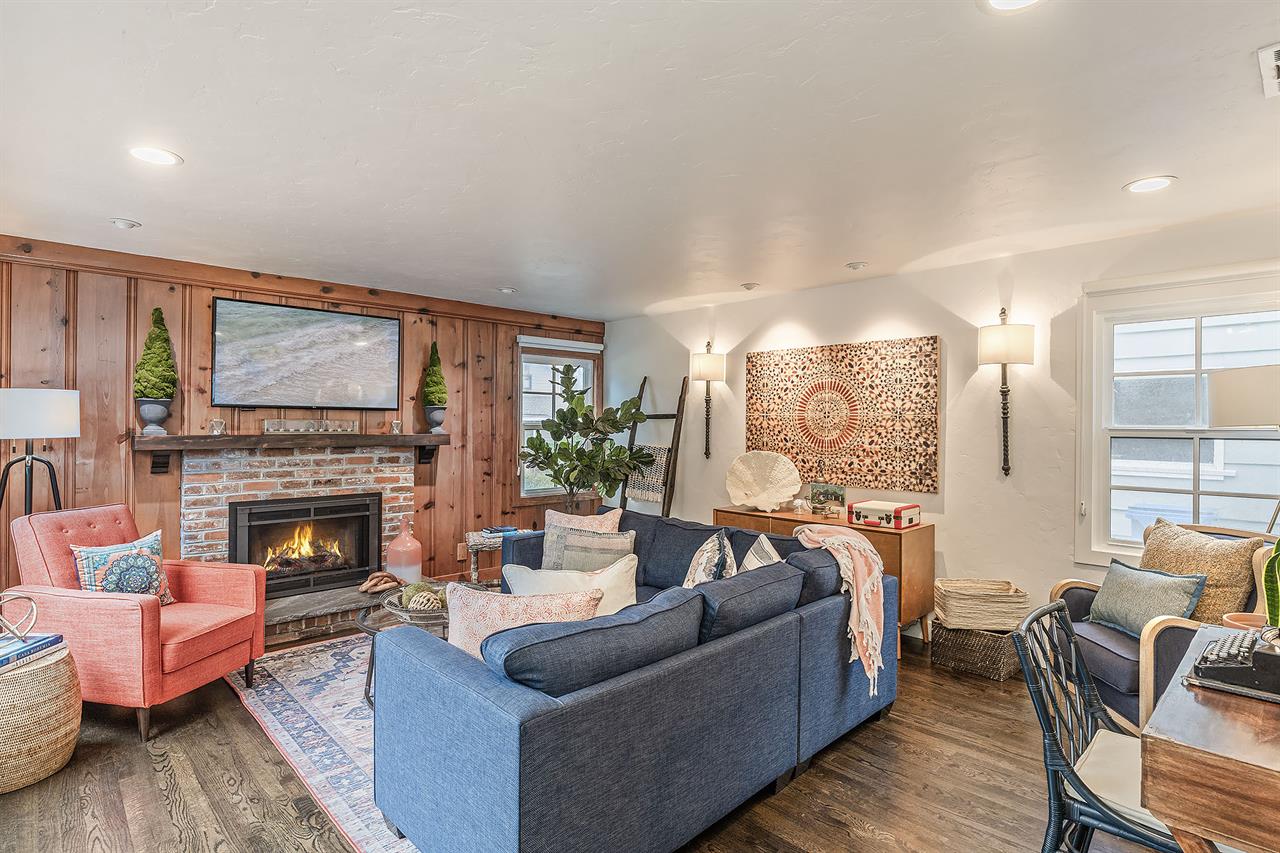 Living Room with Fireplace and a Smart TV