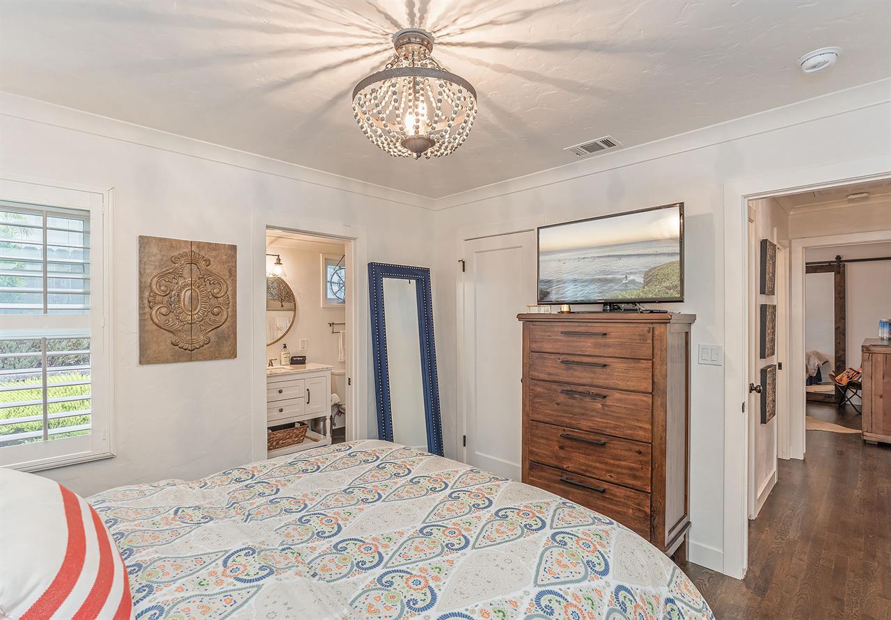 Bedroom 1  Queen Bed, TV, En Suite Bath with a Shower