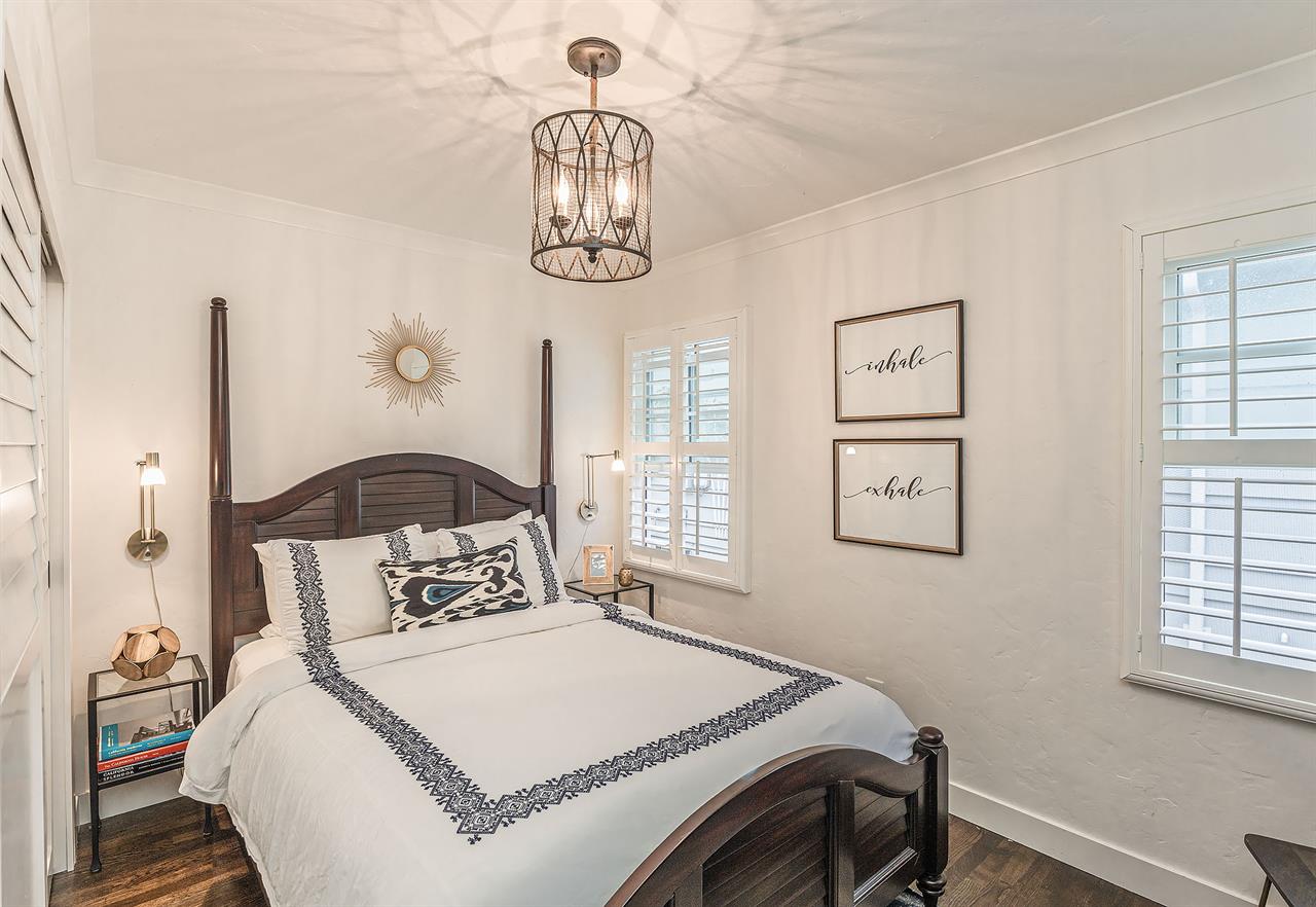 Bedroom 2 has a Queen Bed and TV