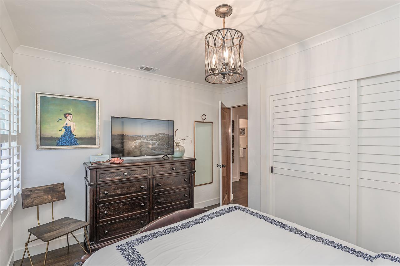 Bedroom 2 has a Queen Bed and TV