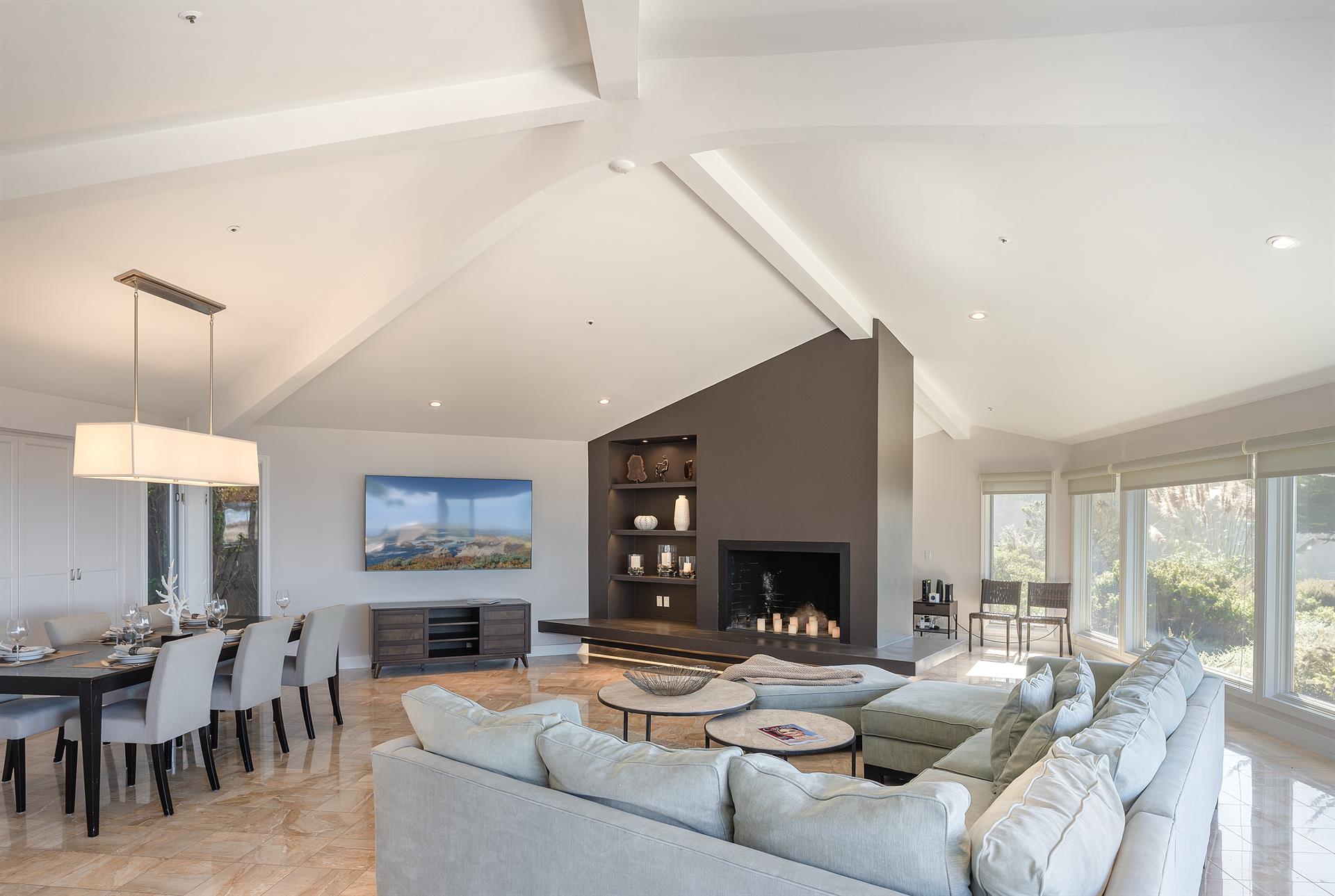 Living Room  Dining Area with Candlelit Fireplace and Smart TV