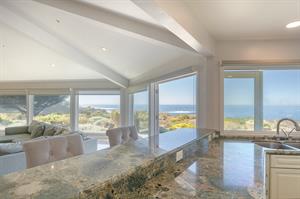 Fully Equipped Gourmet Kitchen has an Ocean view