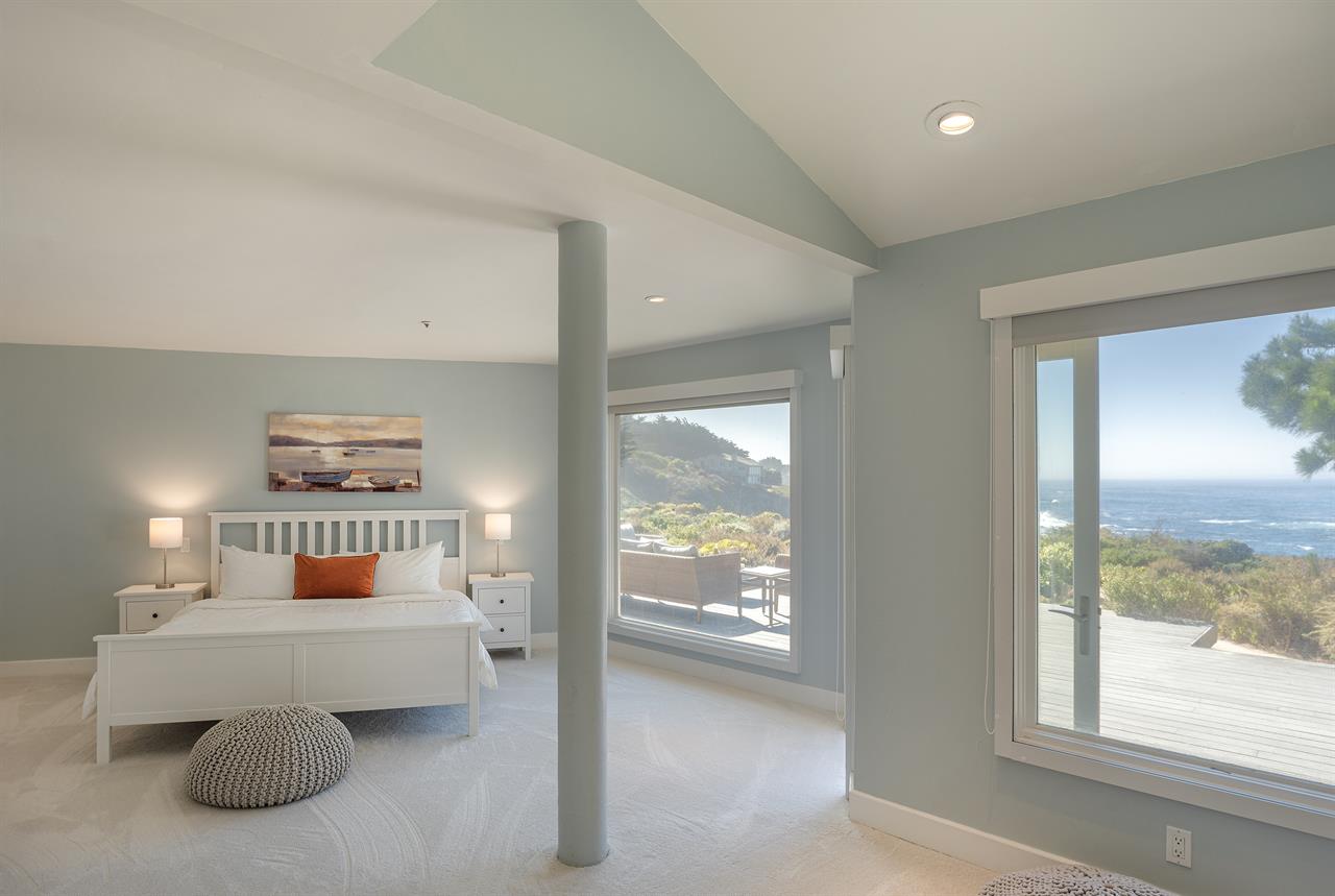 Bedroom 1 has a King Bed, Ocean View and En Suite Bath