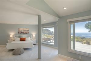 Bedroom 1 has a King Bed, Ocean View and En Suite Bath