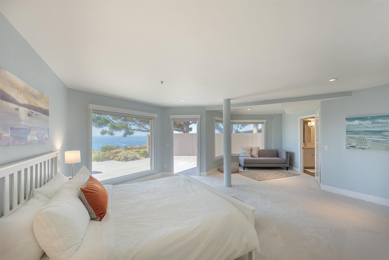Bedroom 1 has a King Bed, Ocean View and En Suite Bath