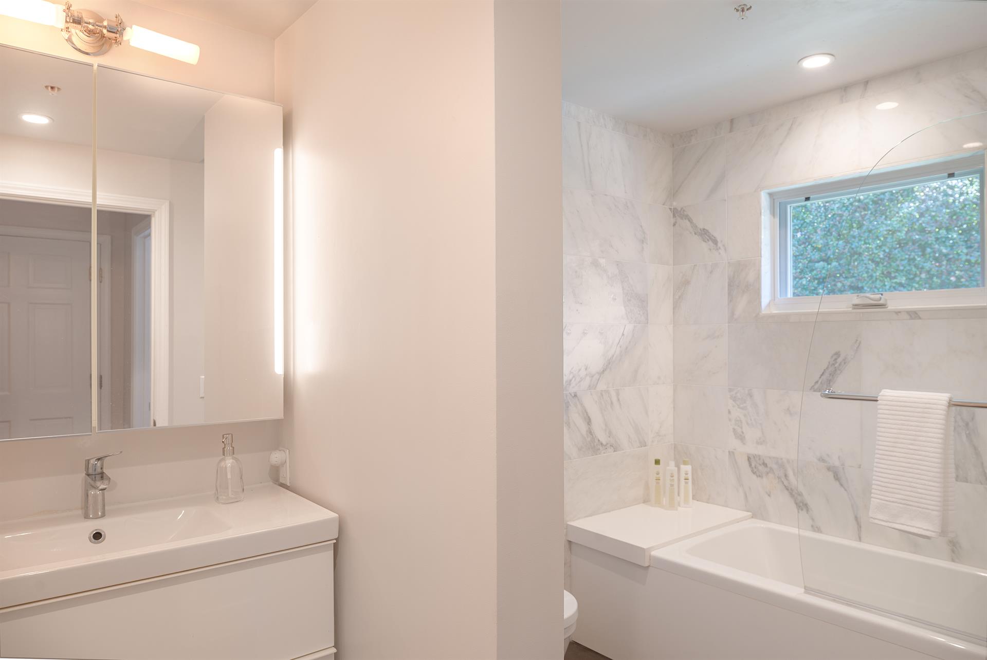 Bathroom 2  Hall Bath with a Shower Over Tub Combo
