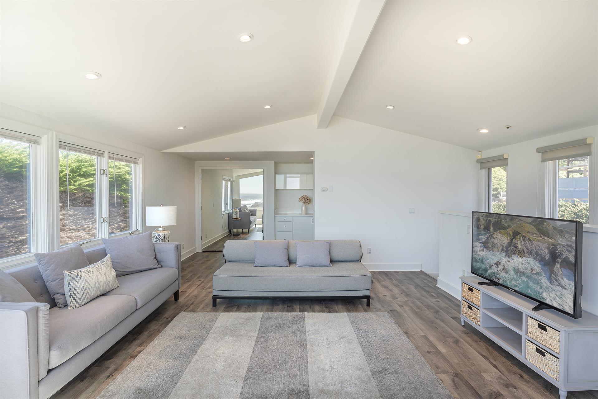 Family Room has a Sofa Bed and a Bathroom Nearby
