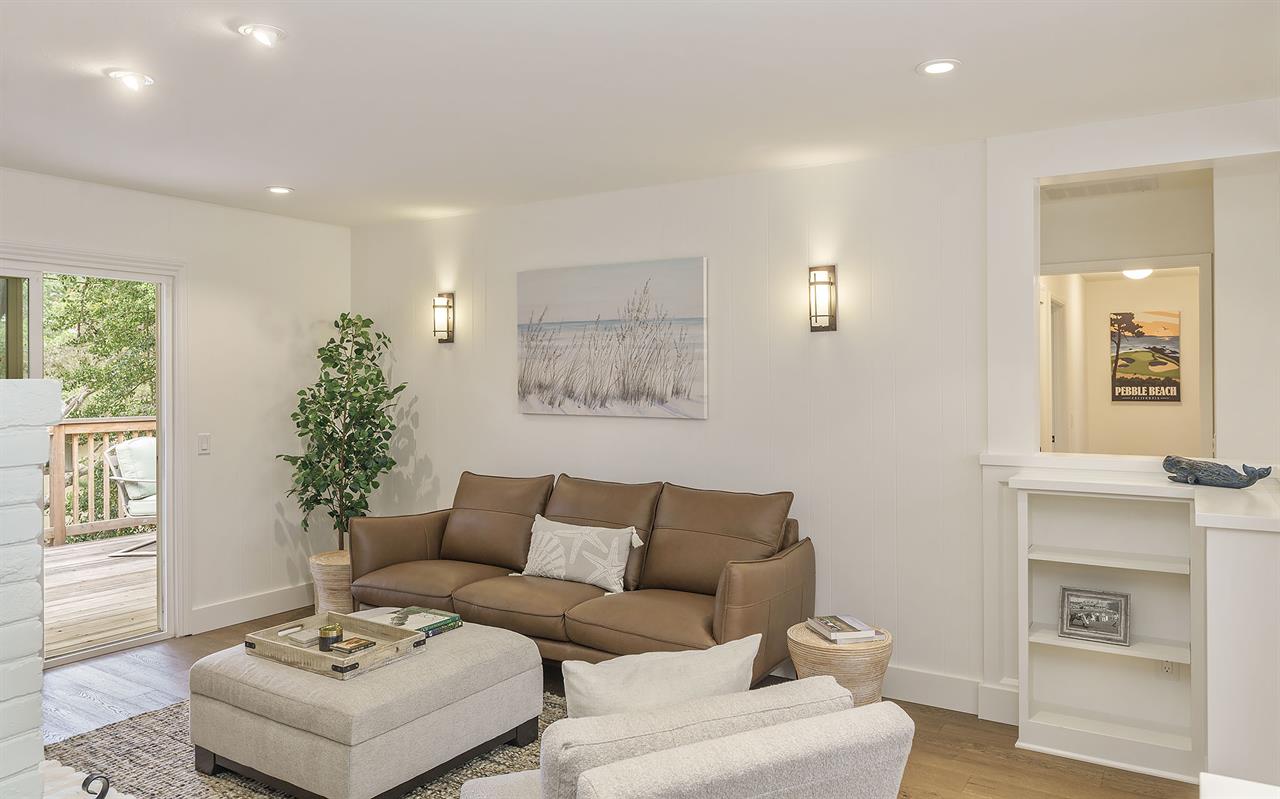 Living Room with Decorative Candlelit Fireplace