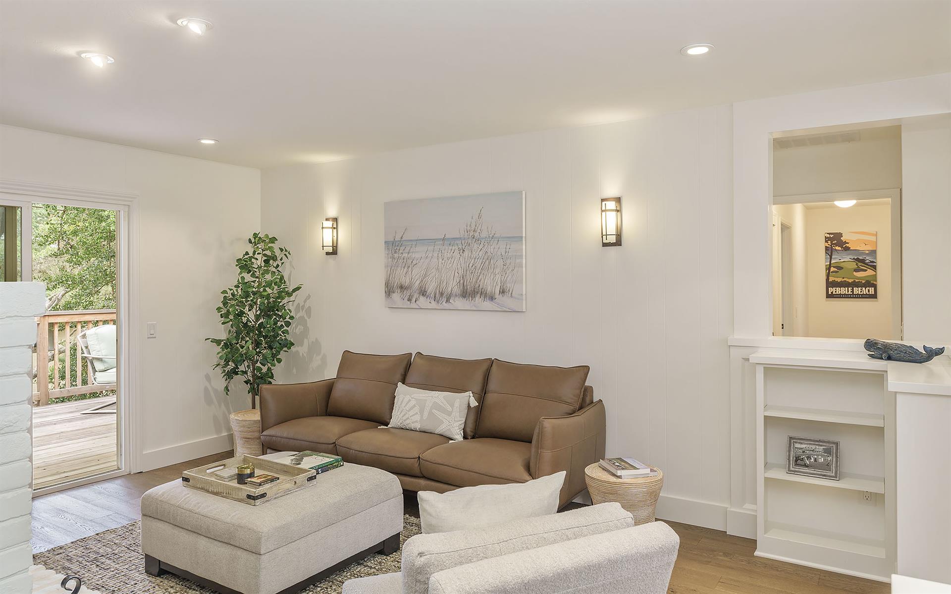 Living Room with Decorative Candlelit Fireplace
