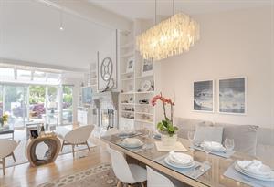 Dining Area Next to the Kitchen and Living Room