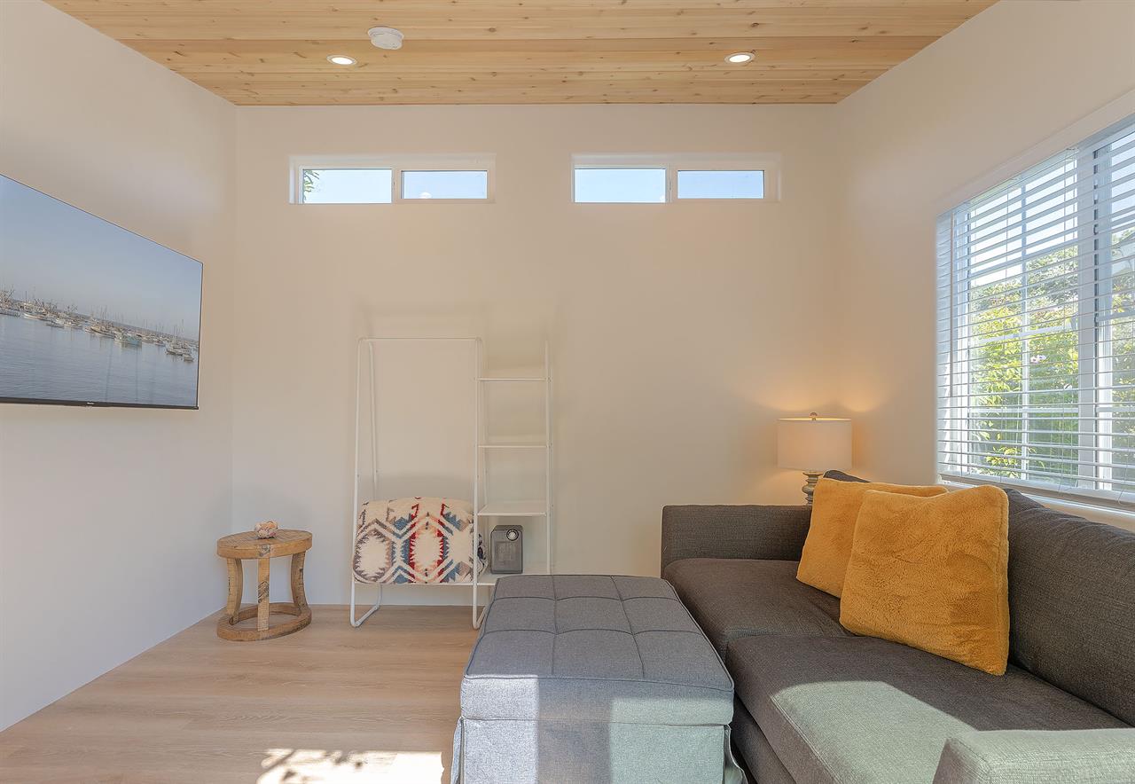 Detached Bonus Room in the Backyard has a Large Smart TV