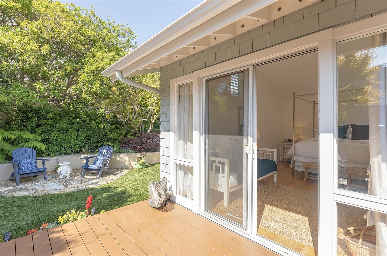 Backyard with Gas BBQ Grill Dining Area and a Hot Tub