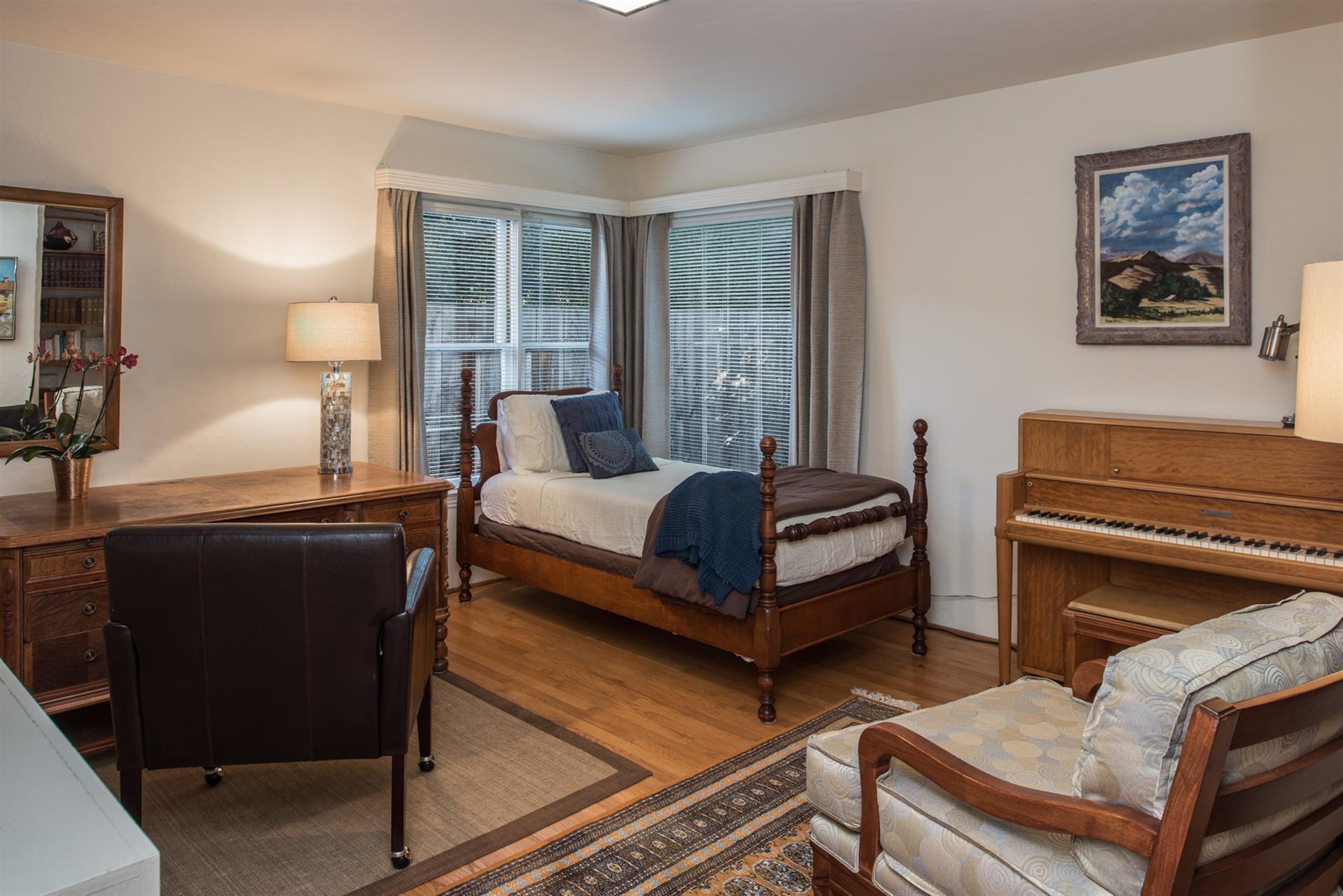 Bedroom 3 with a Twin Bed, Desk, Piano and Library