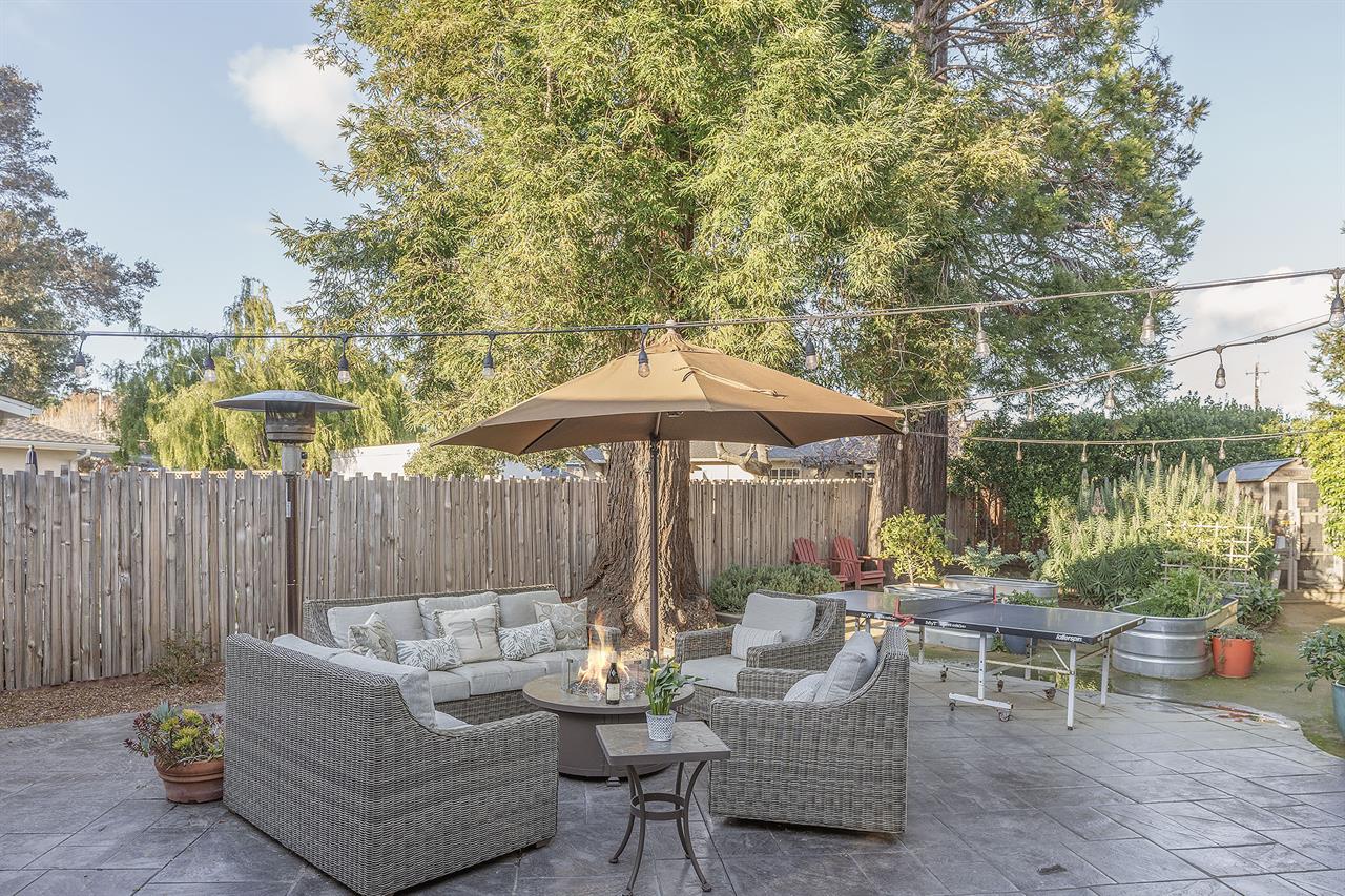 Fenced Back Yard Patio with Heater, Fire Pit and Gas Grill
