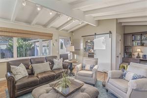 Living Room with HDTV and a Dedicated WorkspaceOffice Area