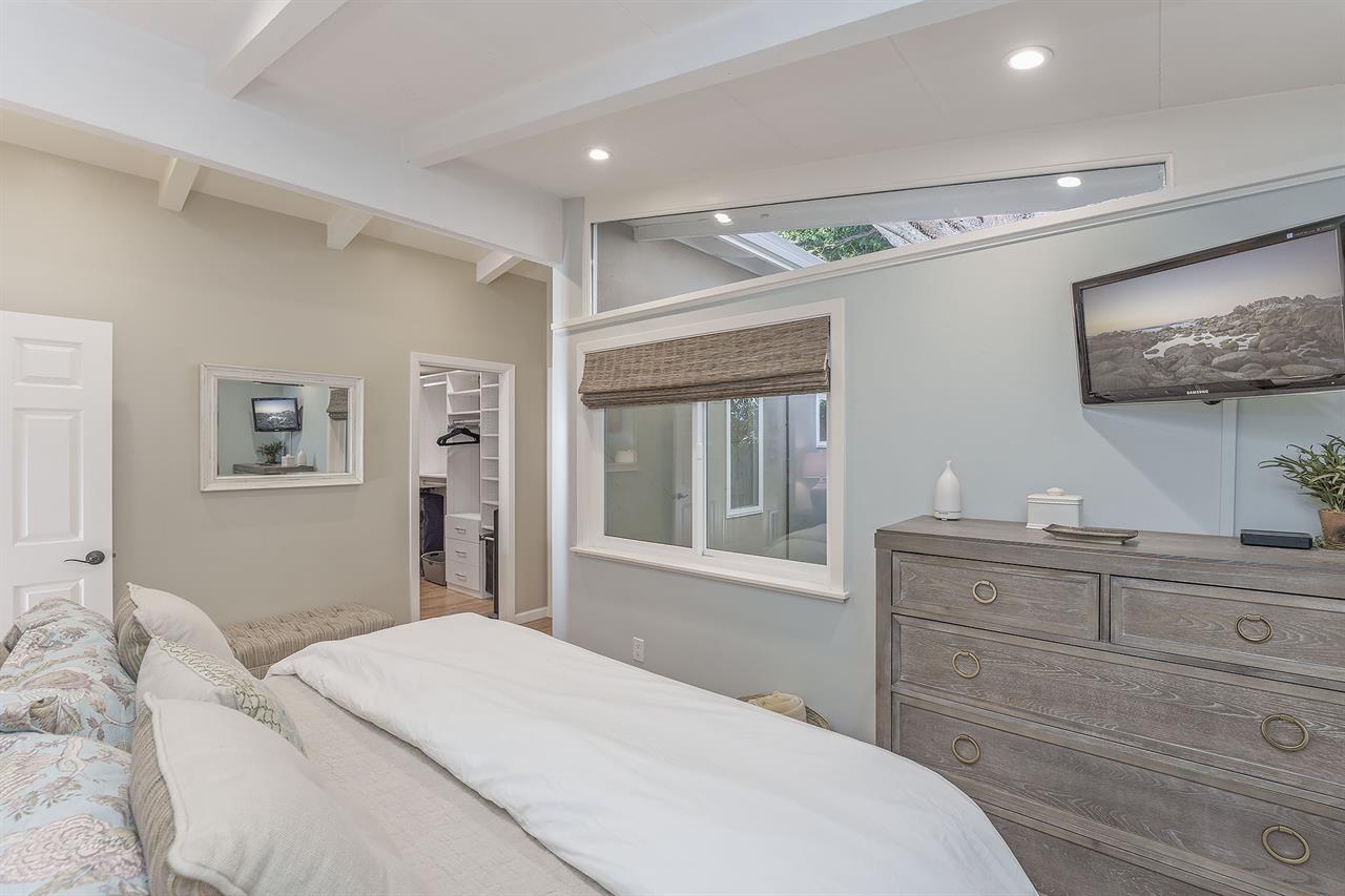 Bedroom 1 with King Bed, HDTV, Luxurious En Suite Bathroom