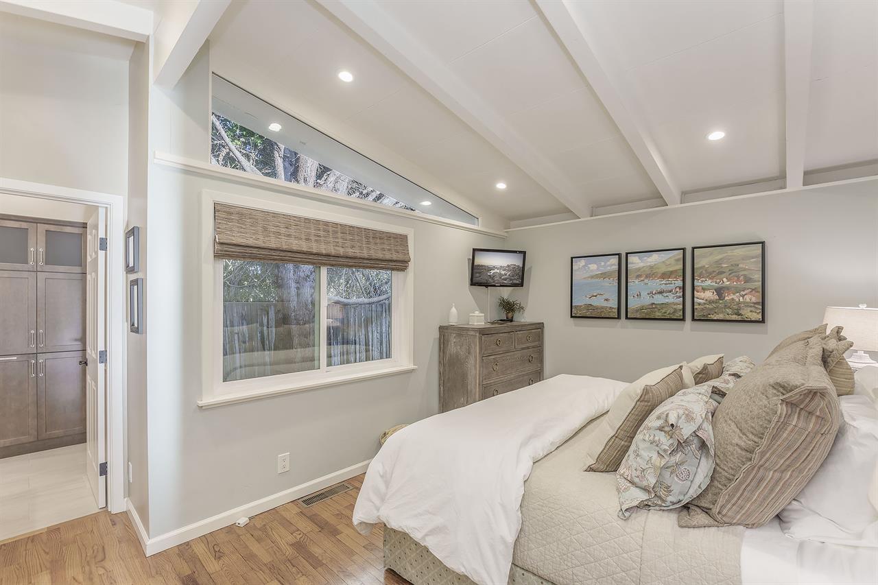 Bedroom 1 with King Bed, HDTV, Luxurious En Suite Bathroom