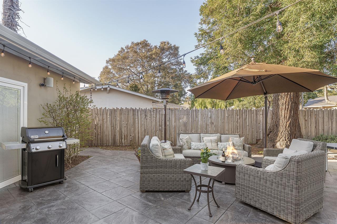 Fenced Back Yard Patio with Heater, Fire Pit and Gas Grill