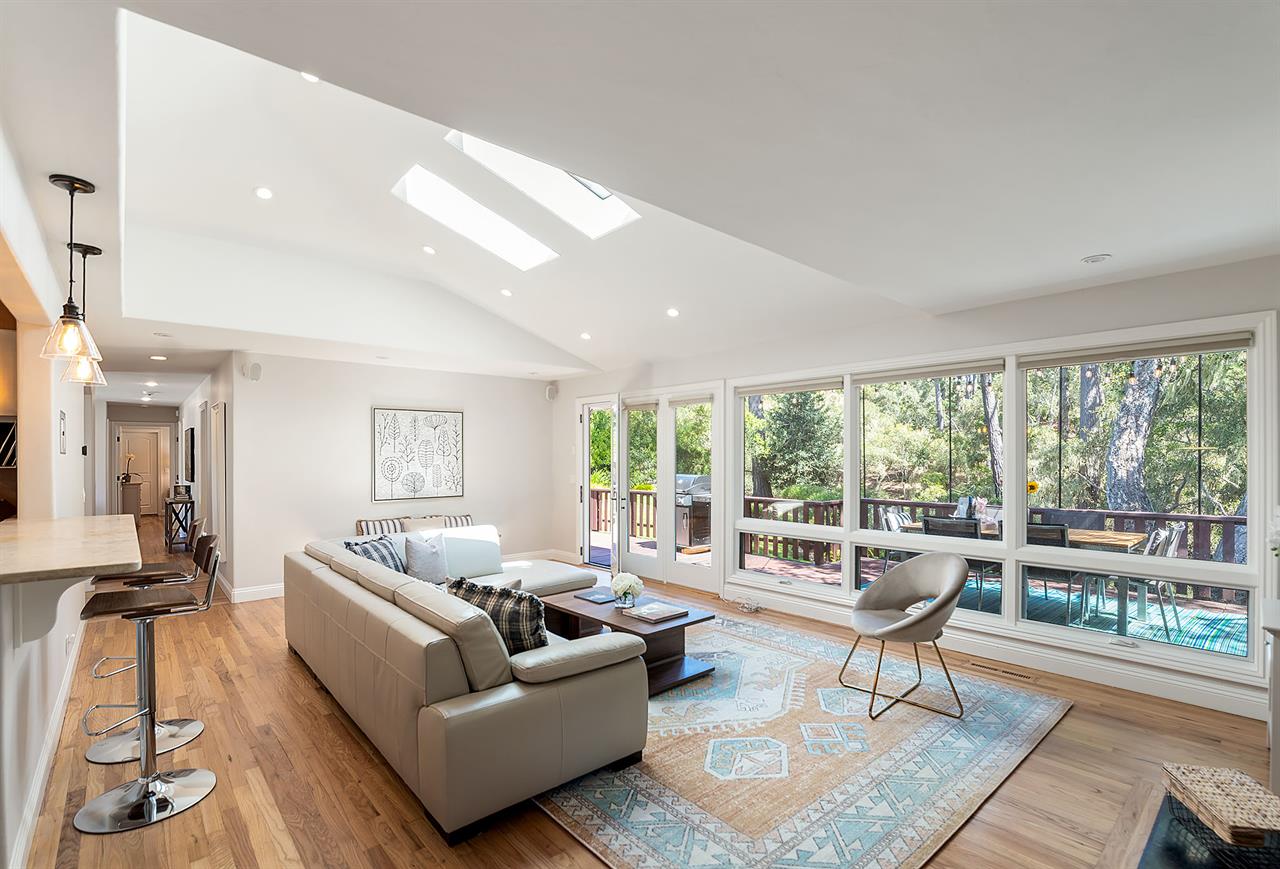 Living Room Opens to the Deck with Dining and Gas BBQ