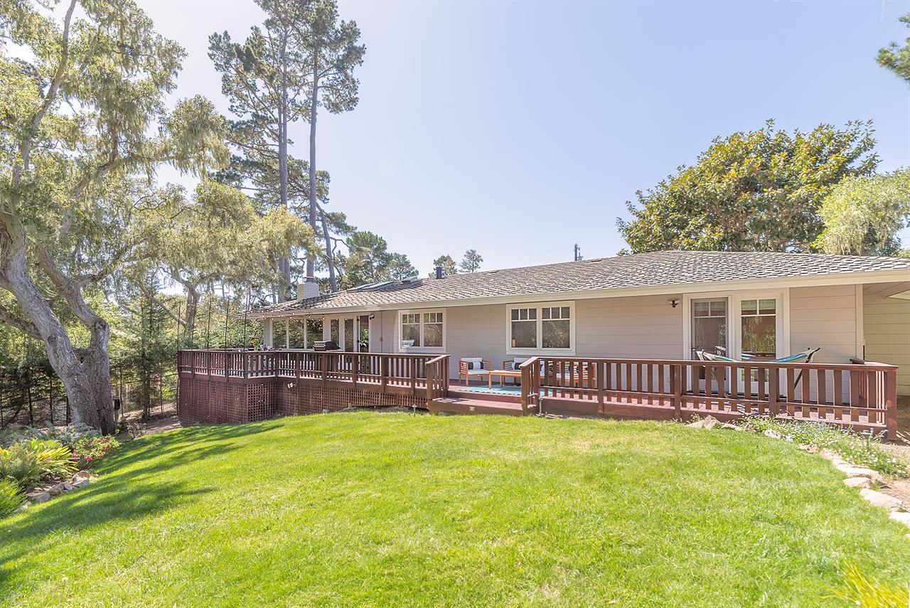 Back of the Home Showing the Spacious Deck