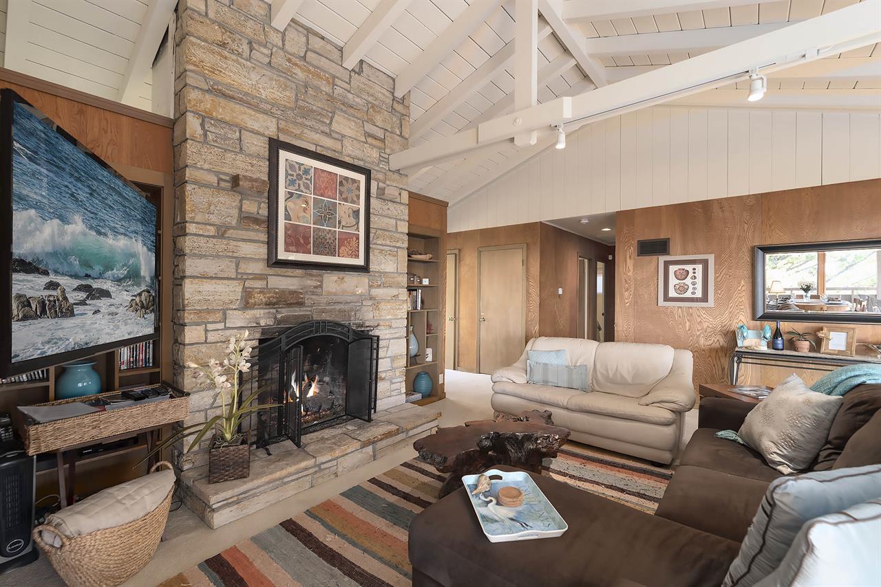 Living Room has a Gas Fireplace and HDTV