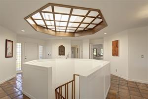 Entry and Spiral Staircase in the Center of the Home