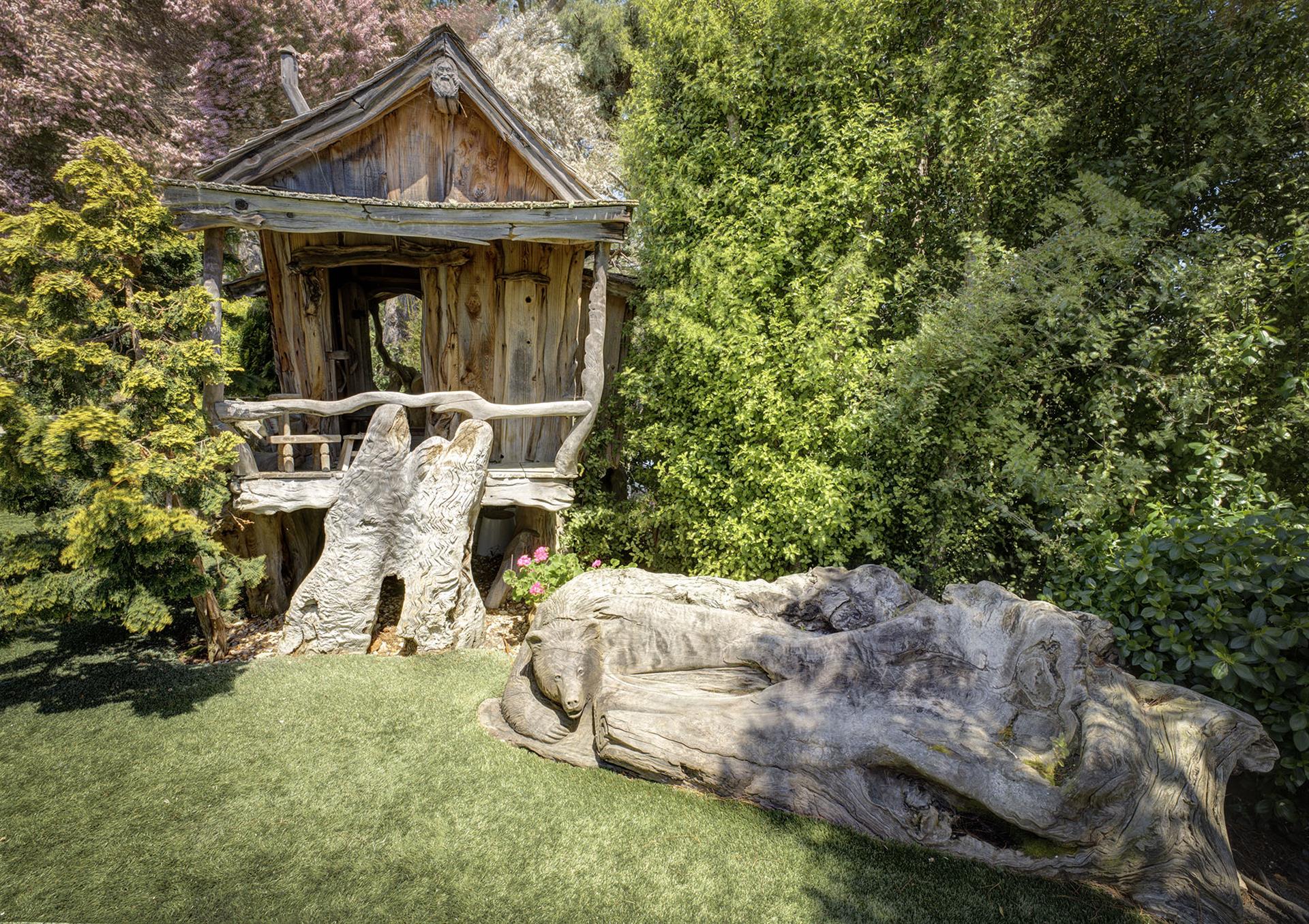 And For the Kids a Wooden Hobbit HousePlayhouse