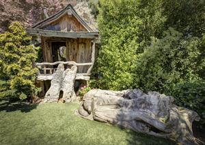 And For the Kids a Wooden Hobbit HousePlayhouse