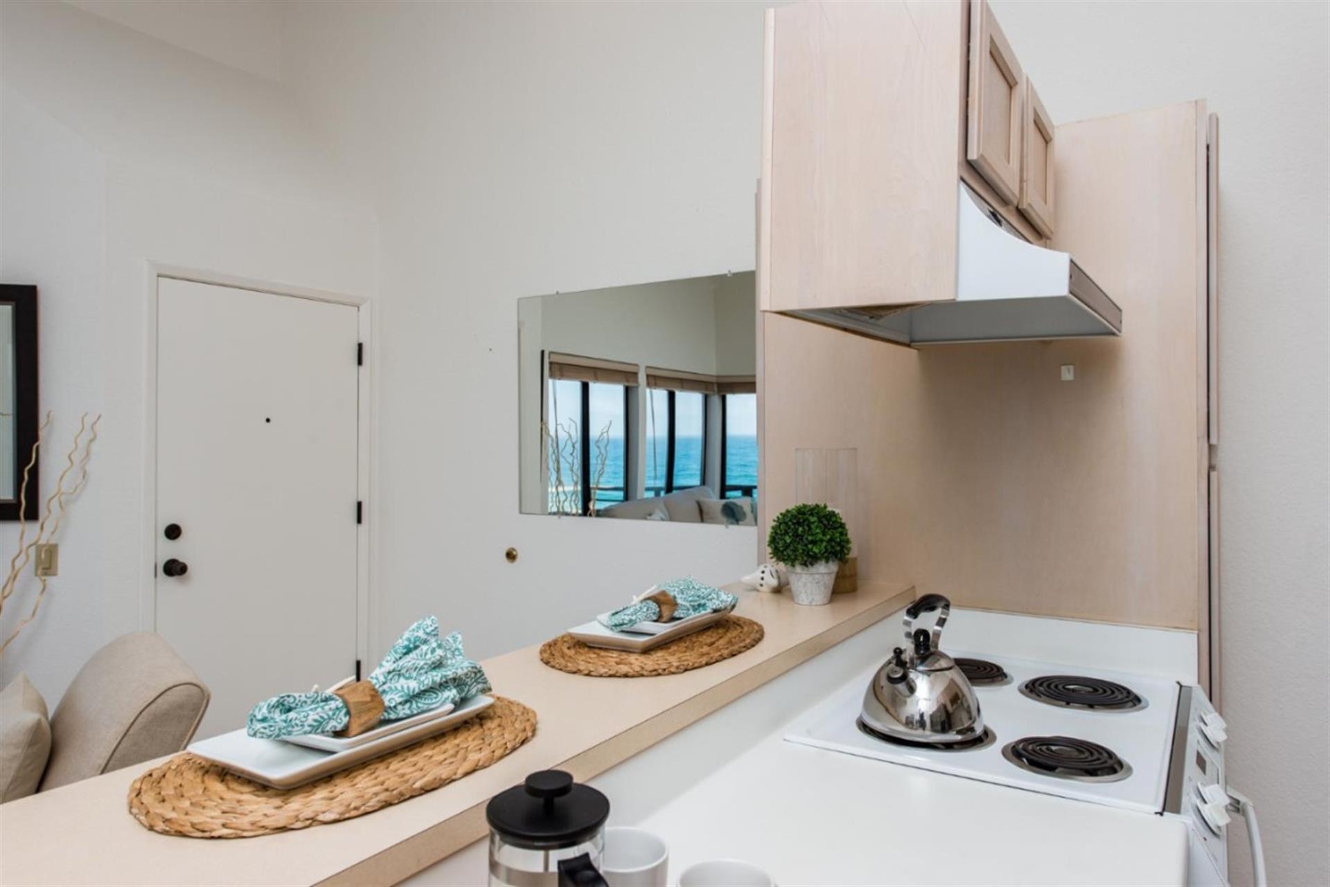 Mirror Near the Kitchen Catches the Ocean View