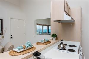 Mirror Near the Kitchen Catches the Ocean View