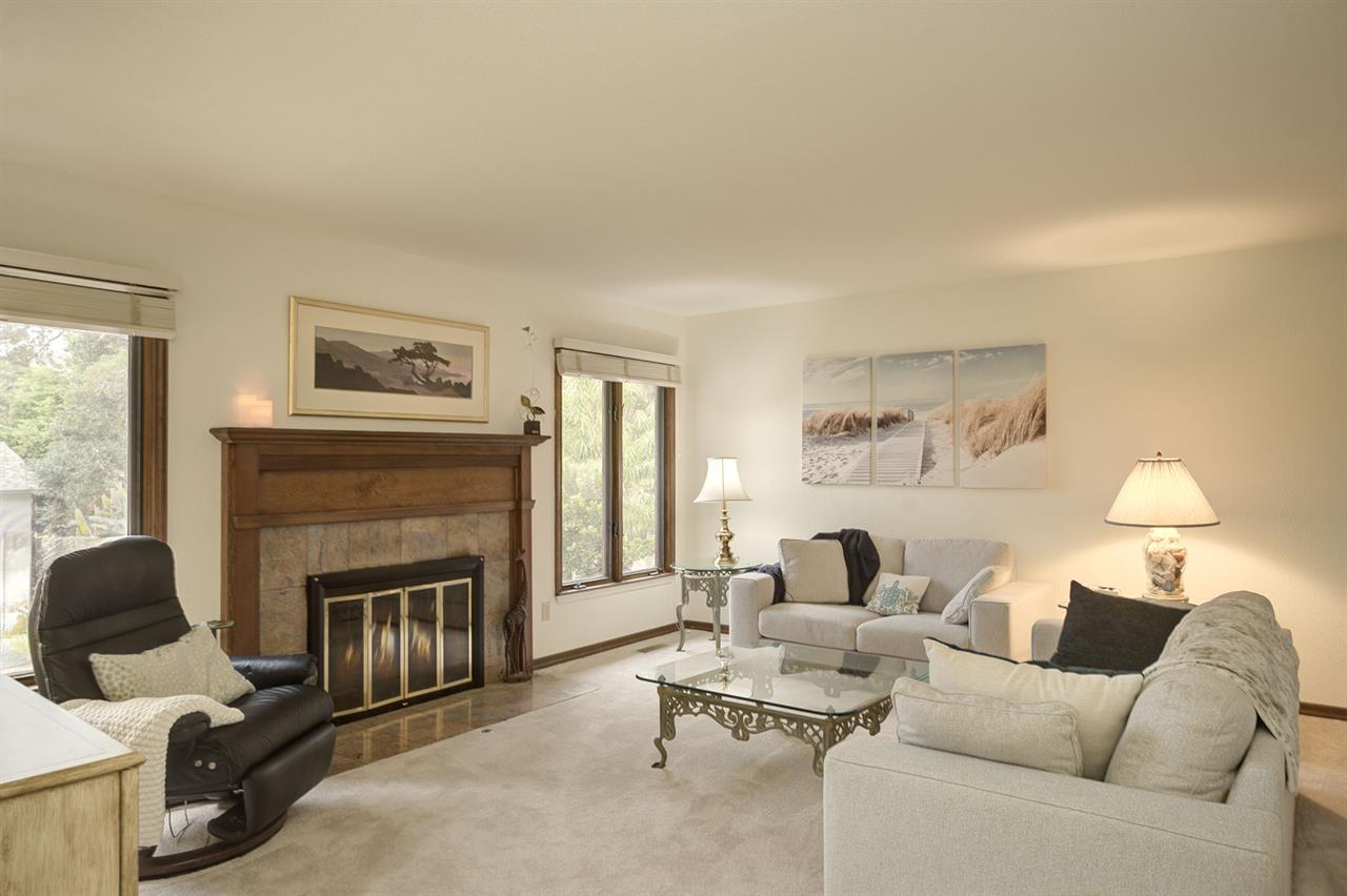 Living Room has TV with Cable Service and a Gas Fireplace